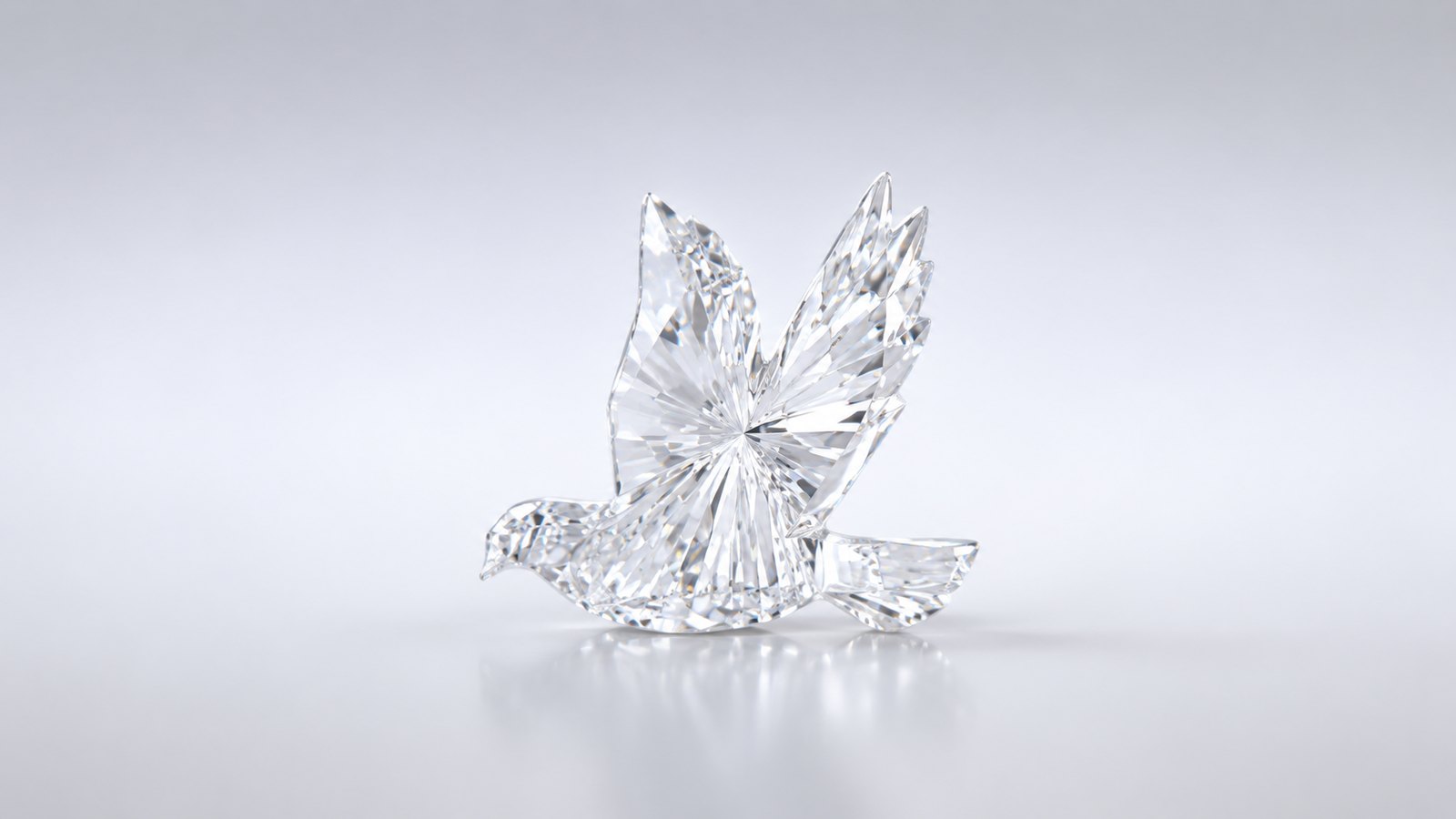 A bird in flight carved and faceted in diamond