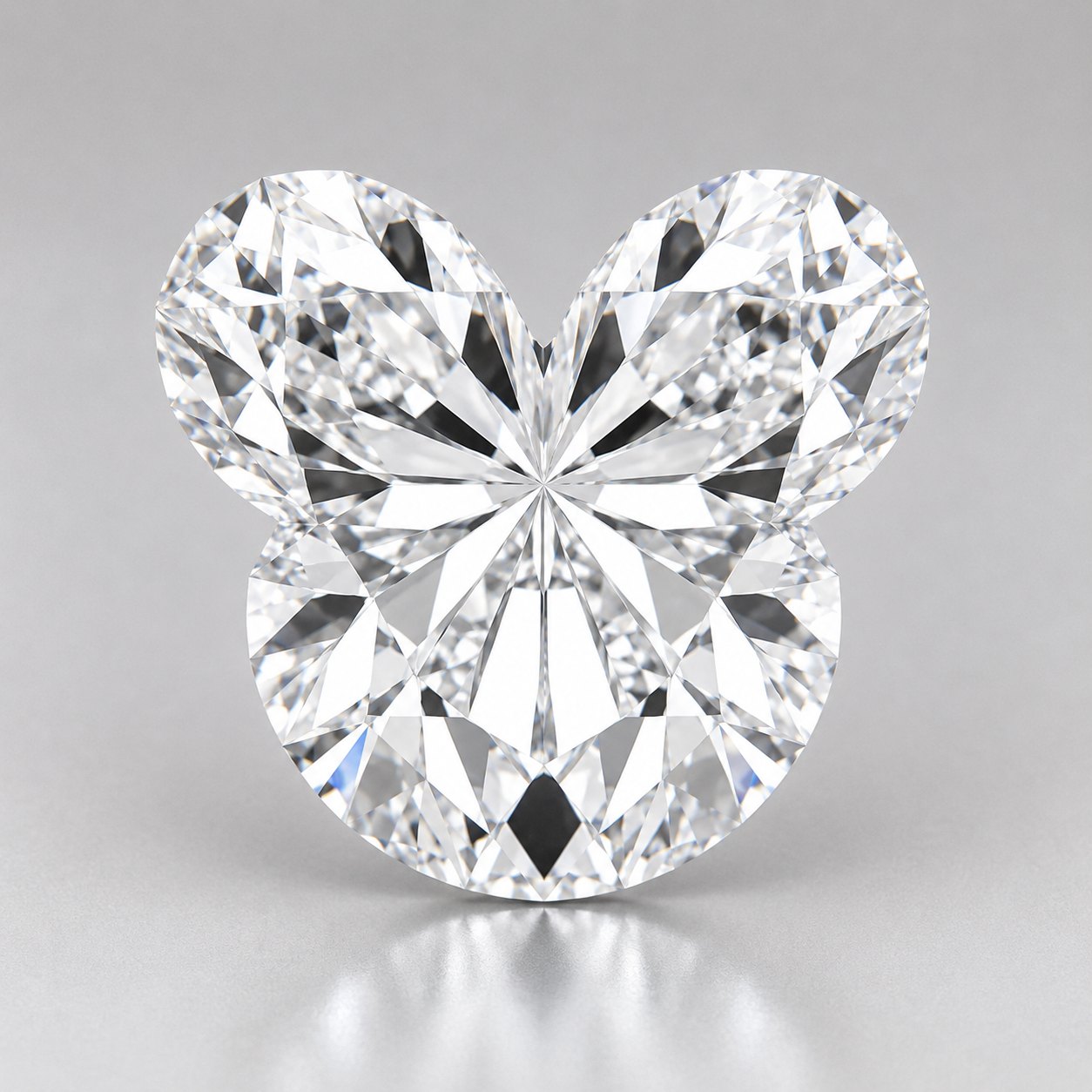 A three-lobe silhouette cut as one stone